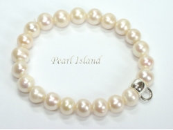 White Roundish Pearl Bracelet with Charm Carrier