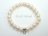 White Roundish Pearl Bracelet with Charm Carrier