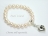 White Roundish Pearl Bracelet with Charm Carrier
