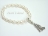 White Oval Pearl Bracelet with Dancing Bride & Groom Charm